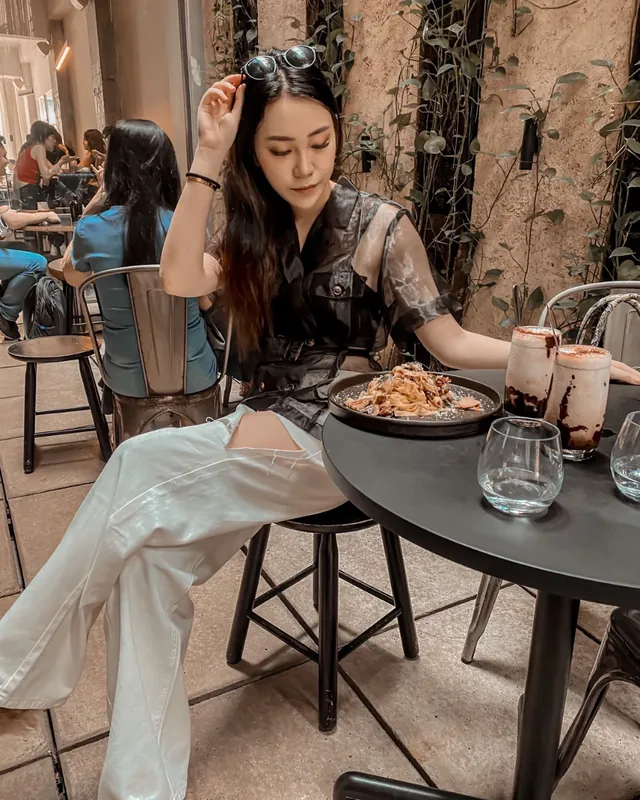 Creator content at outdoor café dining table