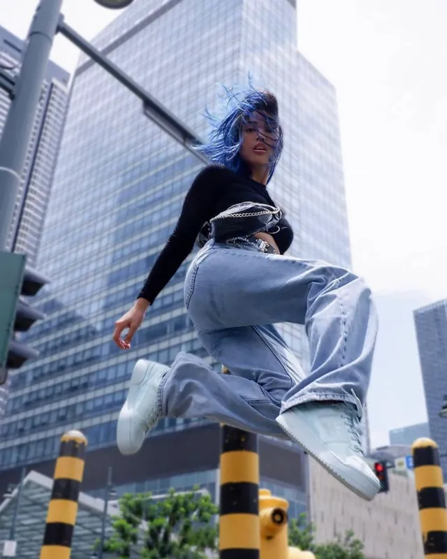 Creator fashion content in denim and embellished outfit