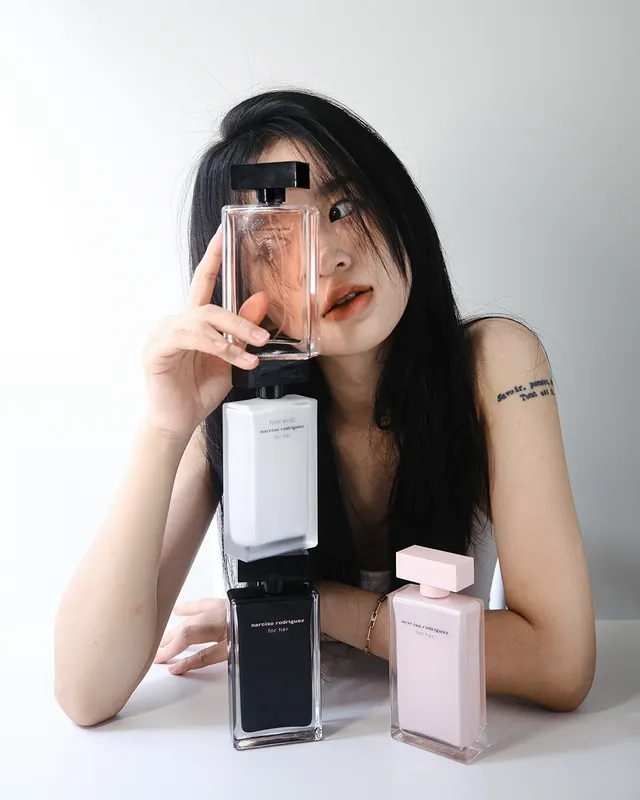 Creator content featuring perfume bottle flat-lay